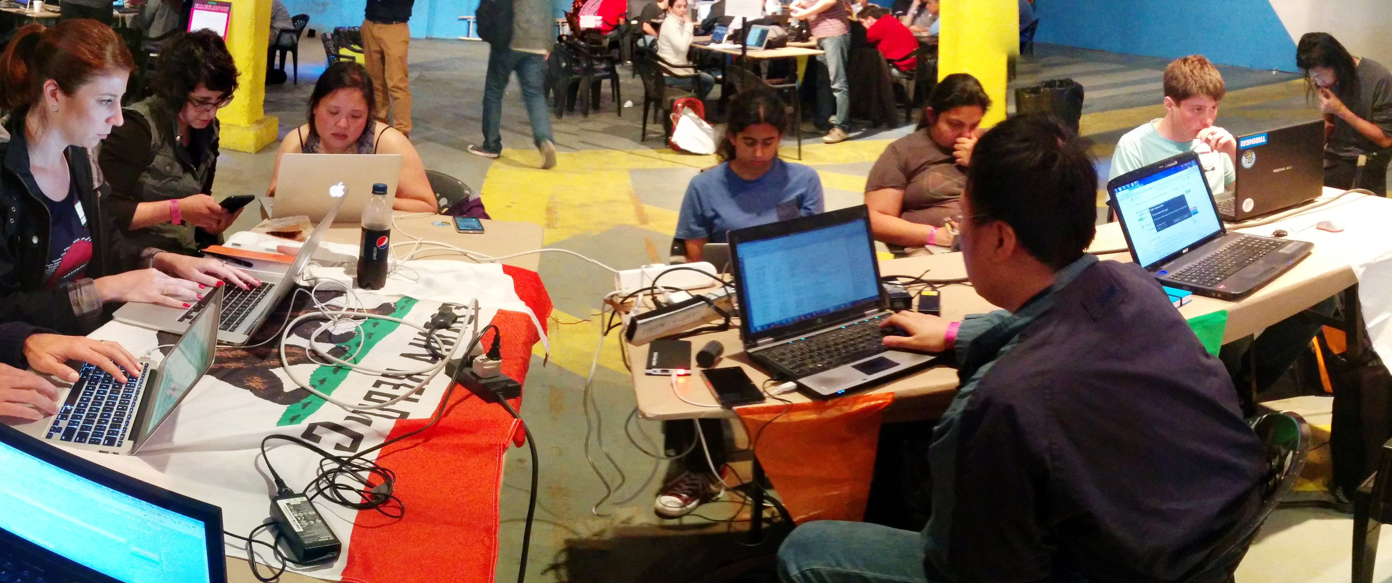 The California Code Rush table at the Saturday hackathon at Media Party 2015